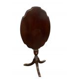 ANTIQUE MAHOGANY TILT TOP TEA TABLE ON BRASS PAW FEET