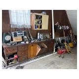 An Assortment of Industrial Shop Items Including a Primitive Oak Store Cabinet, Trumpet Horns, and a Craftsman Air Compressor