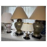 An Assortment of Four Decorative Table Lamps including a Pair of Engraved Brass Urn Lamps
