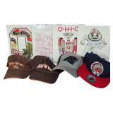 A Collection of NFL and MLB Team Caps and Signed Ohio Sports Art Prints