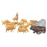 A Set of Twelve Hand Carved African Wooden Safari Animal Figurines