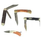 An Assortment of Four Folding Pocket Knives Including Case and Camillus Examples