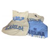 A Collection of University of North Carolina Tar Heels Apparel Including Champion