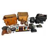An Assortment of Vintage and Modern Cameras, Movie Equipment, and Accessories