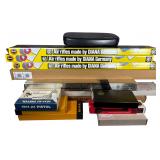 A Collection of Empty Original Factory Firearm Packaging and Cases