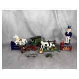 A Collection of Cast Iron Mechanical Bank Reproductions and Die-Cast Vehicles