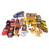 An Assortment of Die-Cast NASCAR Vehicles, Classic Cars, and Wooden Toys