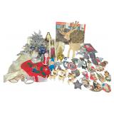 A Collection of Vintage Christmas Ornaments and Holiday Decorations Including Santa Land and Noma