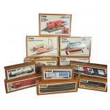 A Collection of Eleven Tyco HO Scale Electric Train Locomotives, Rolling Stock, and Accessory Sets