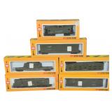 A Six-Piece Collection of Cox HO Scale U.S. Army Military Model Trains in Original Boxes