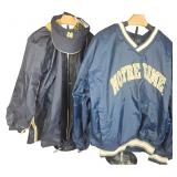 A Trio of University of Notre Dame Fighting Irish Apparel Including Starter Brand Jackets