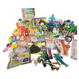 An Assortment of Vintage Action Figures, Fast Food Toys, and Pop Culture Collectibles