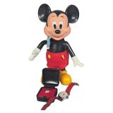 A Trio of Vintage Mickey Mouse Collectibles Including a Posable Figure and an Ingersoll Wristwatch