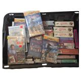 An Assortment of New Old Stock and Assorted VHS Tapes and DVDs including Feature Films and Instructional Media