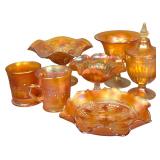 A Collection of 7 Pieces of Marigold Carnival Glass Including Imperial Grape and Orange Tree Patterns