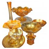 An Assortment of Marigold Carnival Glass Tableware