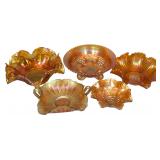 A Collection of Marigold Carnival Glass Bowls and Dishes