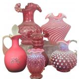 A Collection of Fenton Cranberry Opalescent and Rose Satin Art Glass