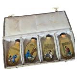 A Set of Four Chinese Inside-Painted Glass Snuff Bottles in Presentation Case
