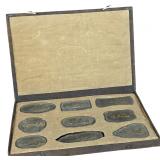 A Set of Nine Chinese Gilt and Polychrome Molded Inksticks