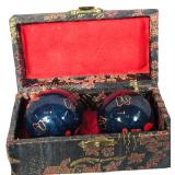 A Pair of Chinese Enamel Baoding Chime Balls in a Brocade Box