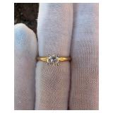 Solitaire engagement ring features a sparkling .50 carat natural round diamond