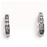 A Pair of 18K White Gold and Diamond Huggie Hoop Earrings