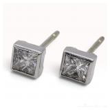 A Pair of Princess-Cut Diamond and Platinum Bezel-Set Stud Earrings