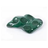 A POLISHED BULLSEYE MALACHITE SPECIMEN