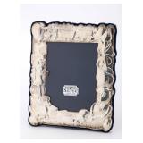 A STERLING SILVER PICTURE FRAME. London, 1995