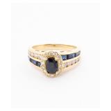 AN 14K DIAMOND AND SAPPHIRE RING.