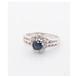 AN 18K DIAMOND AND SAPPHIRE RING.