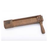 A LARGE WOODEN GRAGGER. Continental, 19th century.
