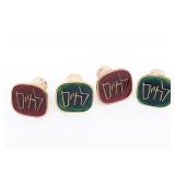 FOUR WINE STOPPERS BY CHAVA WOLPERT.