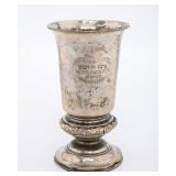 A LARGE SILVER KIDDUSH CUP FROM THE BETH-EL SHULE IN ROMANIA