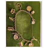 14K yellow gold charm bracelet Mercedes, cable car