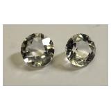 4 carats of moissanite 2 carats each round brilliant