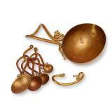 A Joe Spoon Signed Brass Set of Measuring Spoons and Cup