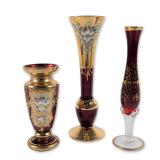 Three Bohemian Cranberry Glass and Gold Vases