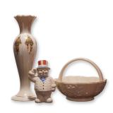 Three Lenox Ivory Porcelain Pieces including Catalan Bud Vase, Floral Basket, and Patriotic Snowman