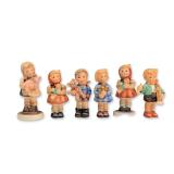 Collection of Six Goebel Hummel Miniature Figurines with Toys, Pig and Flowers