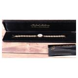 14K GOLD MICHAEL ANTHONY LADIES WRIST WATCH W/ DIA