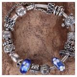 PANDORA STERLING SILVER BRACELET WITH 15 CHARMS