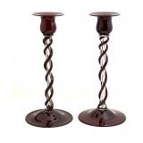 Pair of Steuben Red Candlesticks