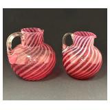 Two Cranberry Strip Pitchers