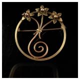 Kreisler Gold Toned Stylized Floral Circle Brooch