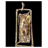 A Brutalist Style Rectangular Pendant Brooch in Silver and Gold Toned Metal