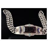 A Vintage Silver and Multi-Stone Decorative Panel Bracelet with Enamel Accents