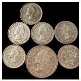 A Collection of Seven Dominican Republic 10 and 25 Centavos Coins