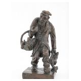 A BRONZE SCULPTURE BY ISAACHAR RYBACK. Signed.